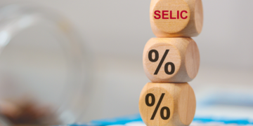 Selic pode chegar a 14% em 2026 após revisão de bancos e piora do cenário econômico 11 GAZETA MERCANTIL Selic A 14,50%: Copom Mantém Cautela, Mercado Reage E Inflação Pressiona Próximos Passos-Gazeta Mercantil